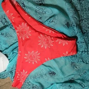 Romwe Bikini Bottom Size Large Red with Sun Design in White